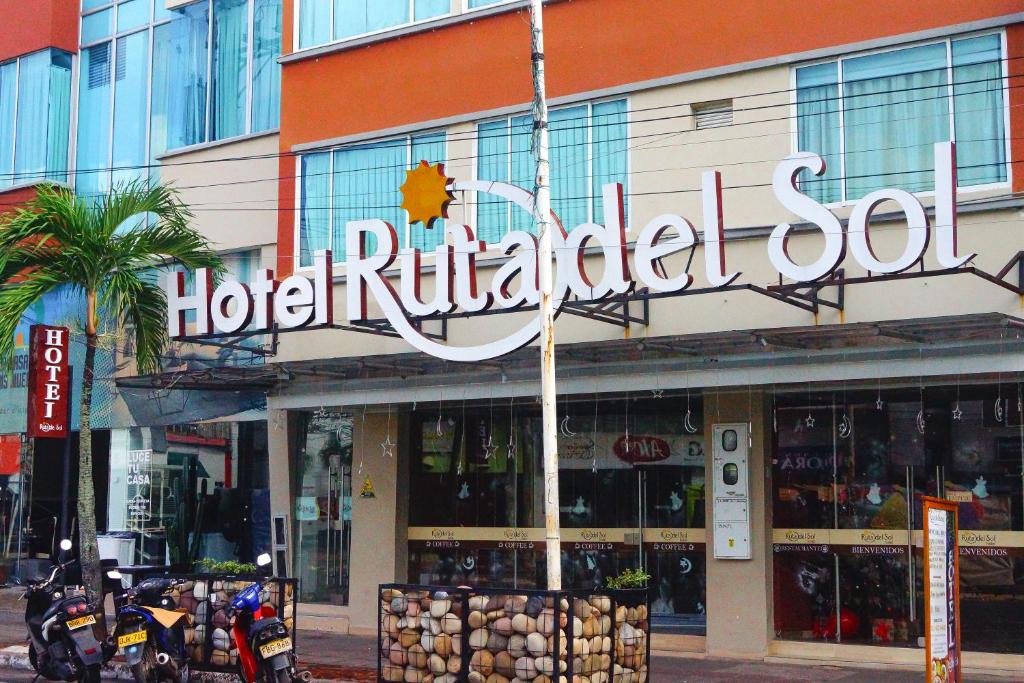 a hotel retrieval sign on the side of a building at HOTEL RUTA DEL SOL in Barrancabermeja