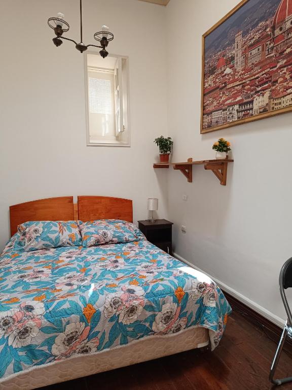 Postel nebo postele na pokoji v ubytování Hostal Tulio Porteño