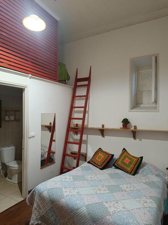 Postel nebo postele na pokoji v ubytování Hostal Tulio Porteño