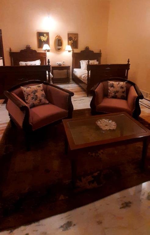 Postel nebo postele na pokoji v ubytování Cavalry Villa bikaner