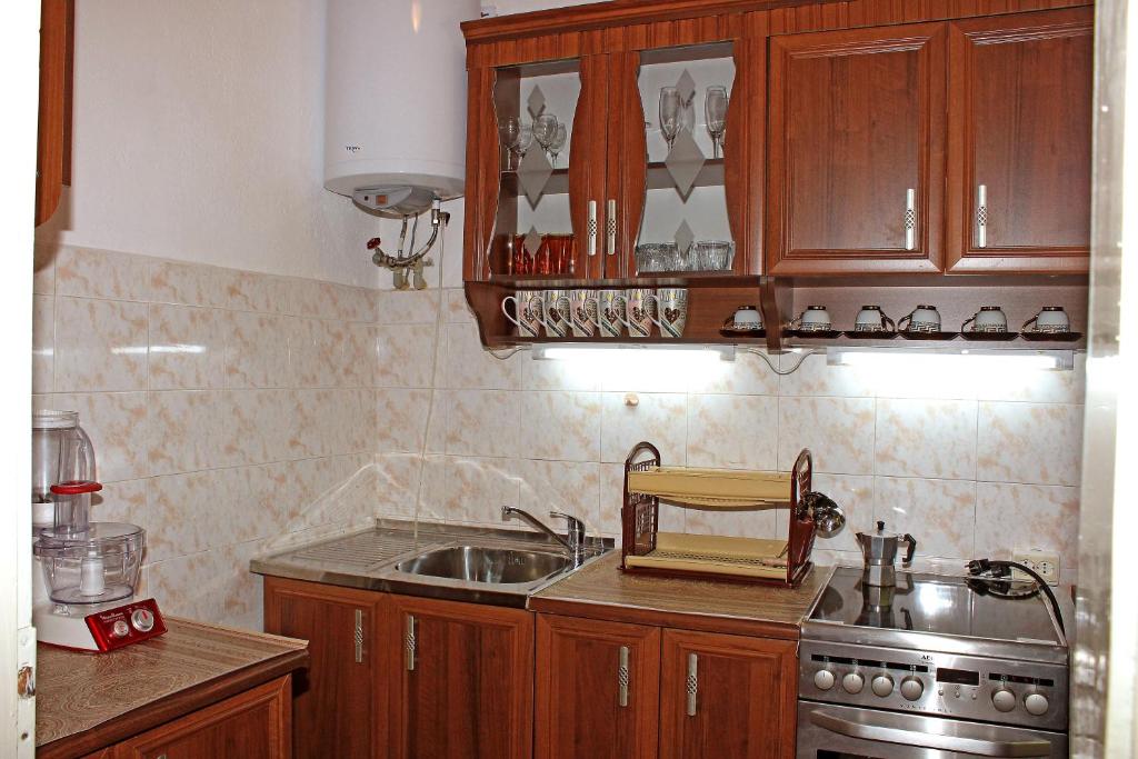 Kuchyň nebo kuchyňský kout v ubytování Apartment downtown