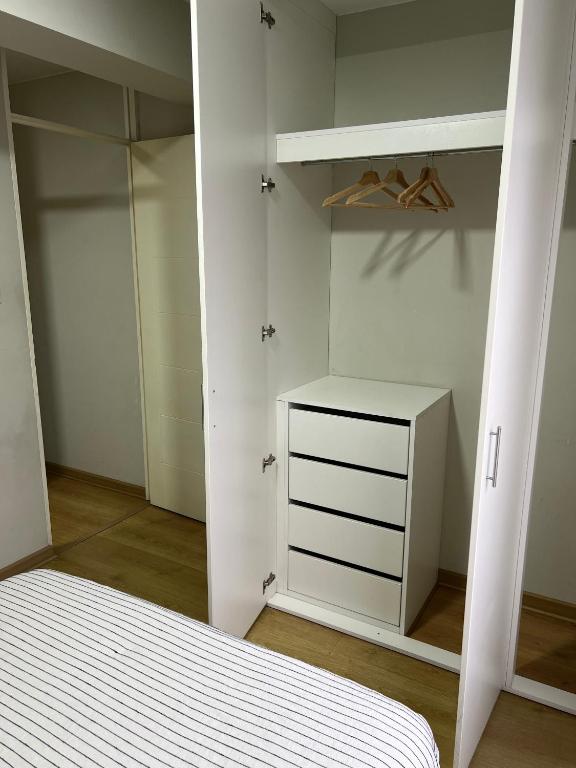 Postel nebo postele na pokoji v ubytování Departamento Compartido San Isidro