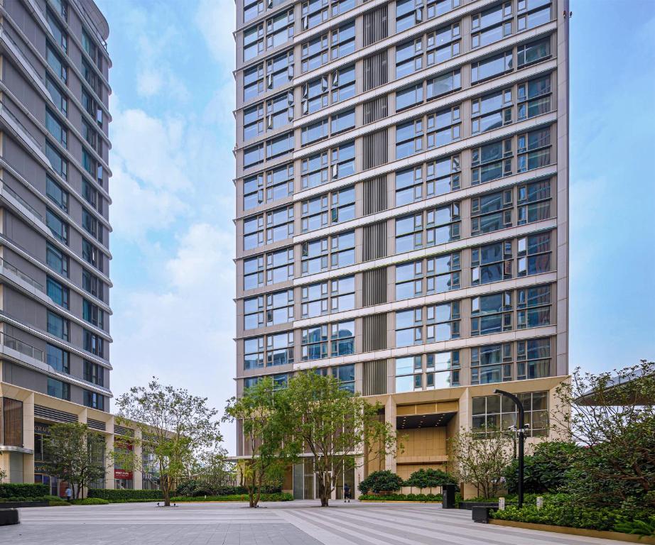 a rendering of a tall building at Livetour Hotel Sanxi Metro Guangzhou in Guangzhou