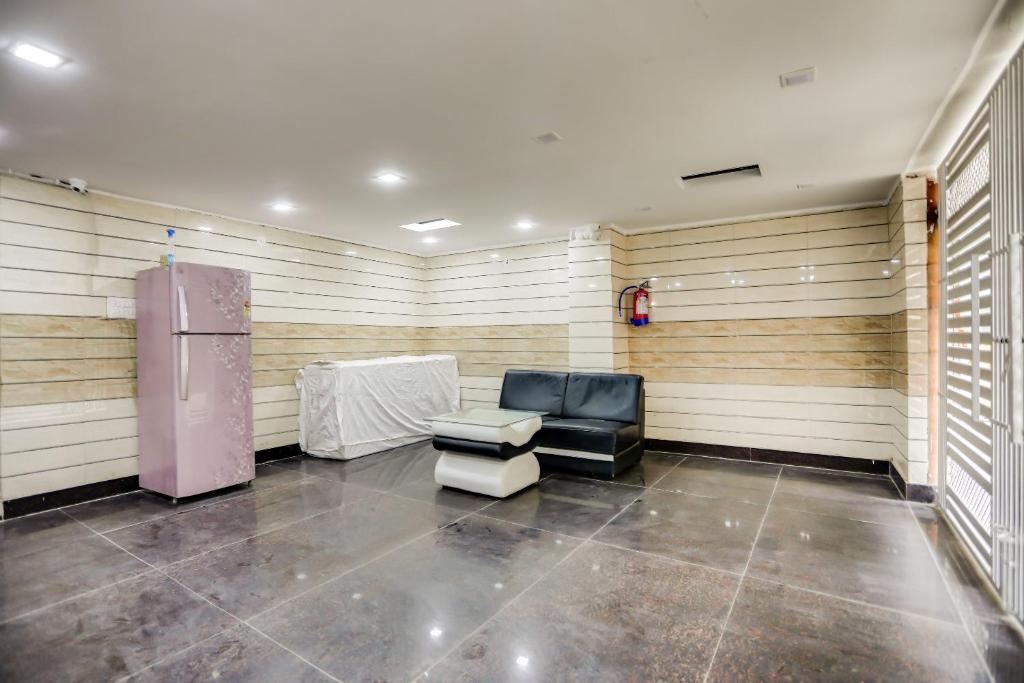 Posezení v ubytování Hotel O Anshun Residency Near Mk Cinemas Rohini