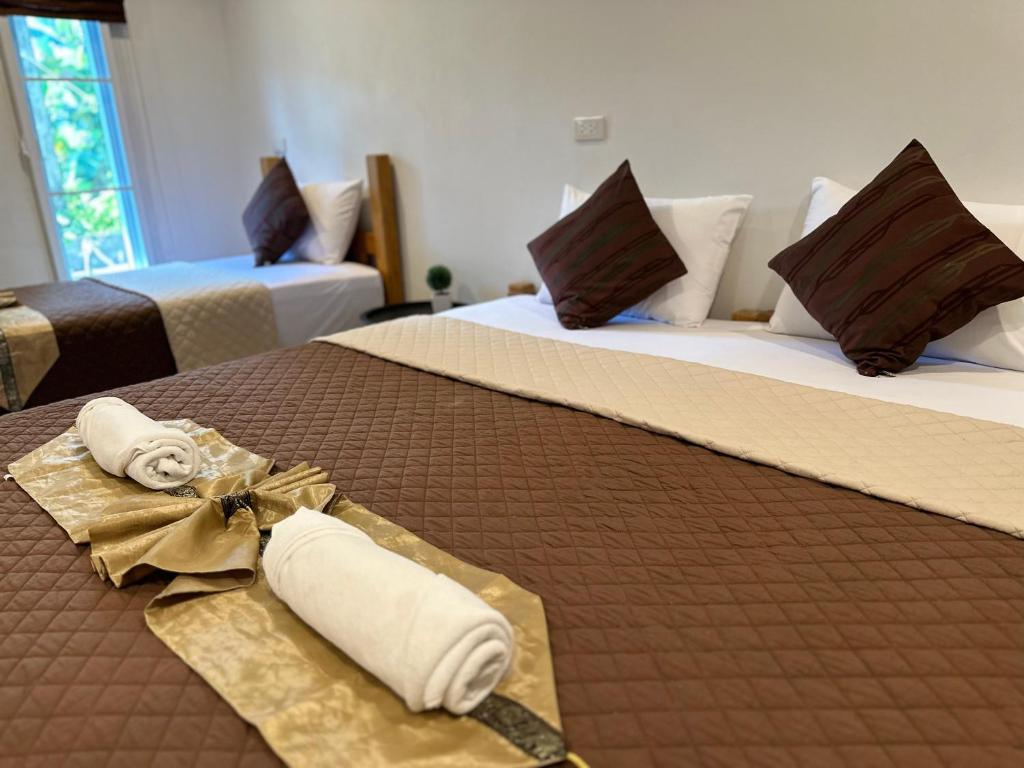 Postel nebo postele na pokoji v ubytování Suntalee House