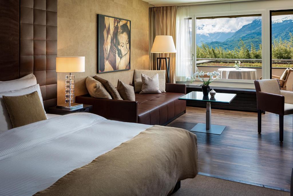Postel nebo postele na pokoji v ubytování Park Hotel Sonnenhof - Relais & Châteaux