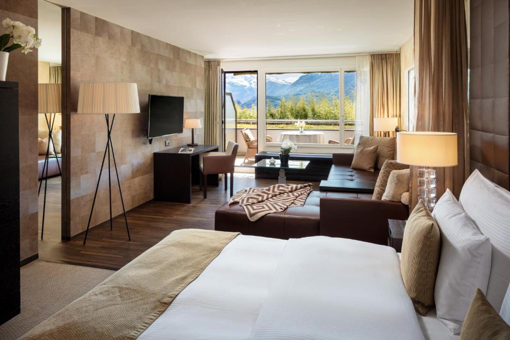 Postel nebo postele na pokoji v ubytování Park Hotel Sonnenhof - Relais & Châteaux