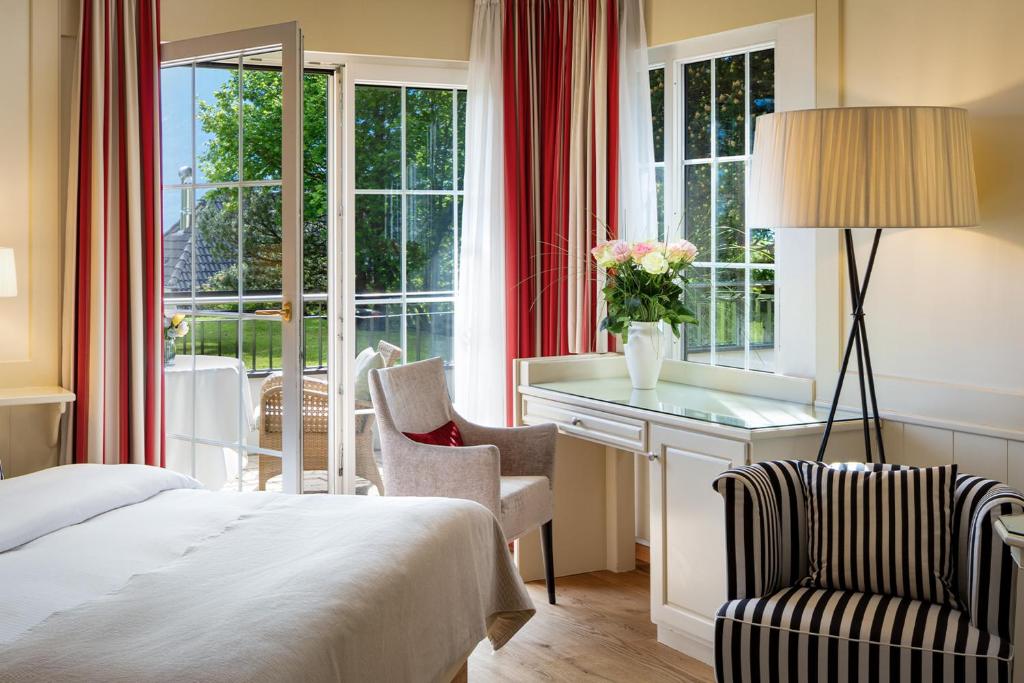 Postel nebo postele na pokoji v ubytování Park Hotel Sonnenhof - Relais & Châteaux