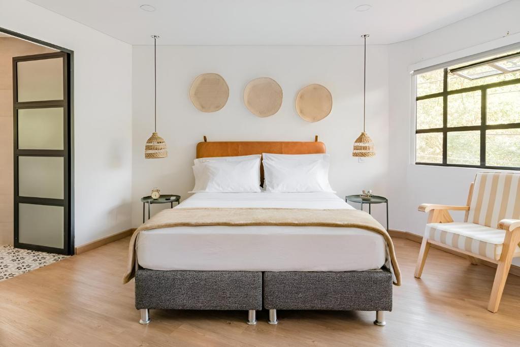 Postel nebo postele na pokoji v ubytování 574 Hotel