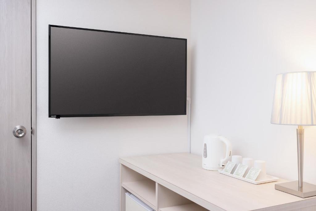 TV a/nebo společenská místnost v ubytování Auberge Amanohashidate