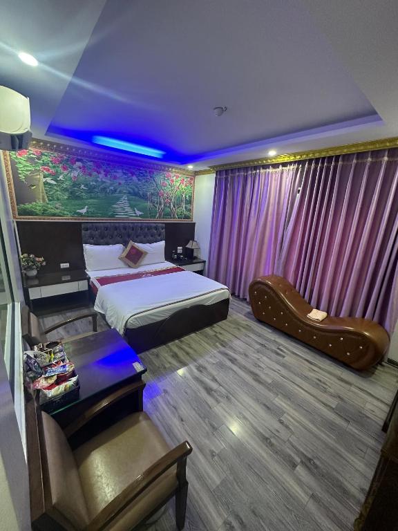 Posezení v ubytování Hoàng Gia Long Biên Hotel