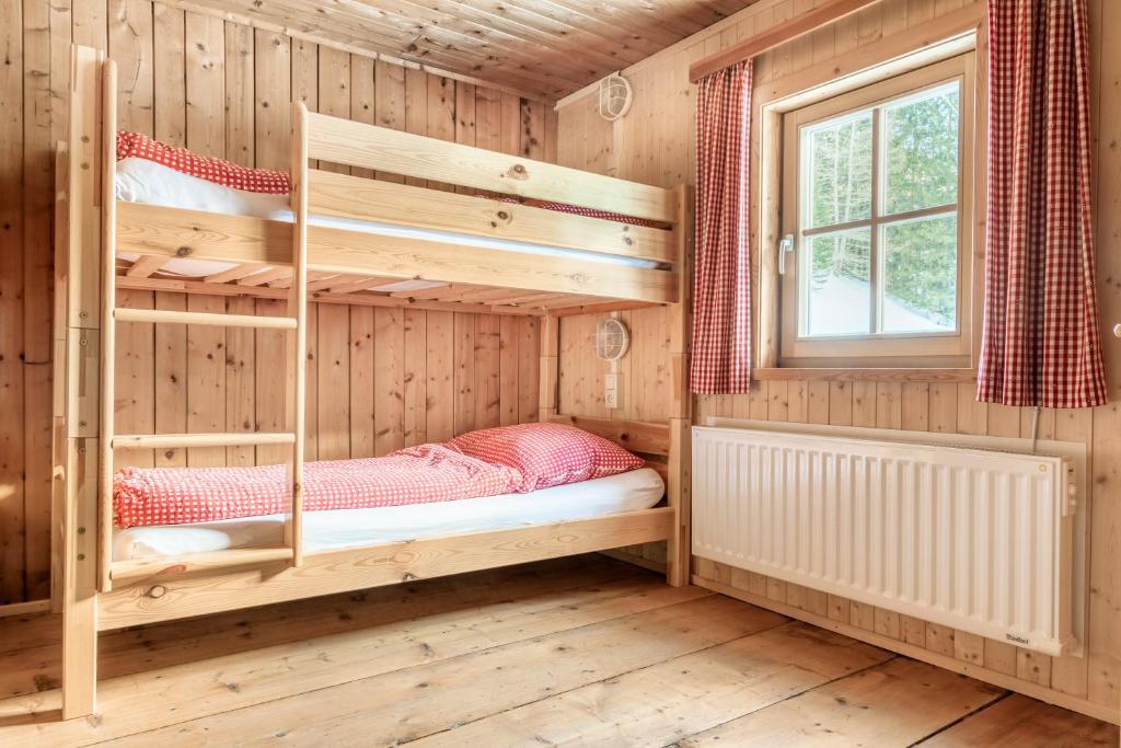 Posteľ alebo postele v izbe v ubytovaní Hauserlhütte
