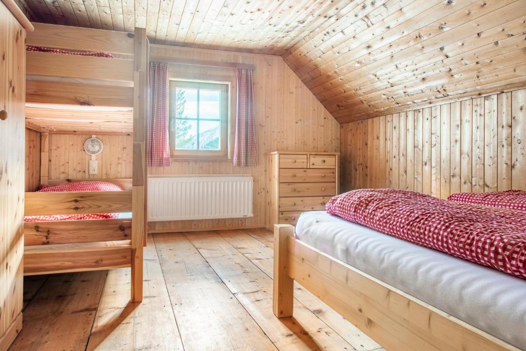 Posteľ alebo postele v izbe v ubytovaní Hauserlhütte