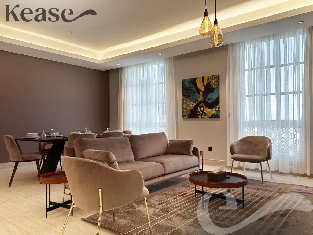 a living room with a couch and a table at Kease King Salman S-6 Lusso Najd XZ90 in Riyadh