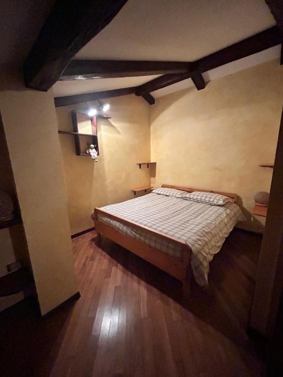 Postel nebo postele na pokoji v ubytování B&B Borgata 2000