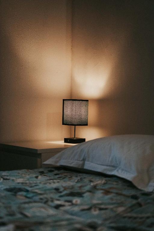 Postel nebo postele na pokoji v ubytování Résidence du Parc appartement calme