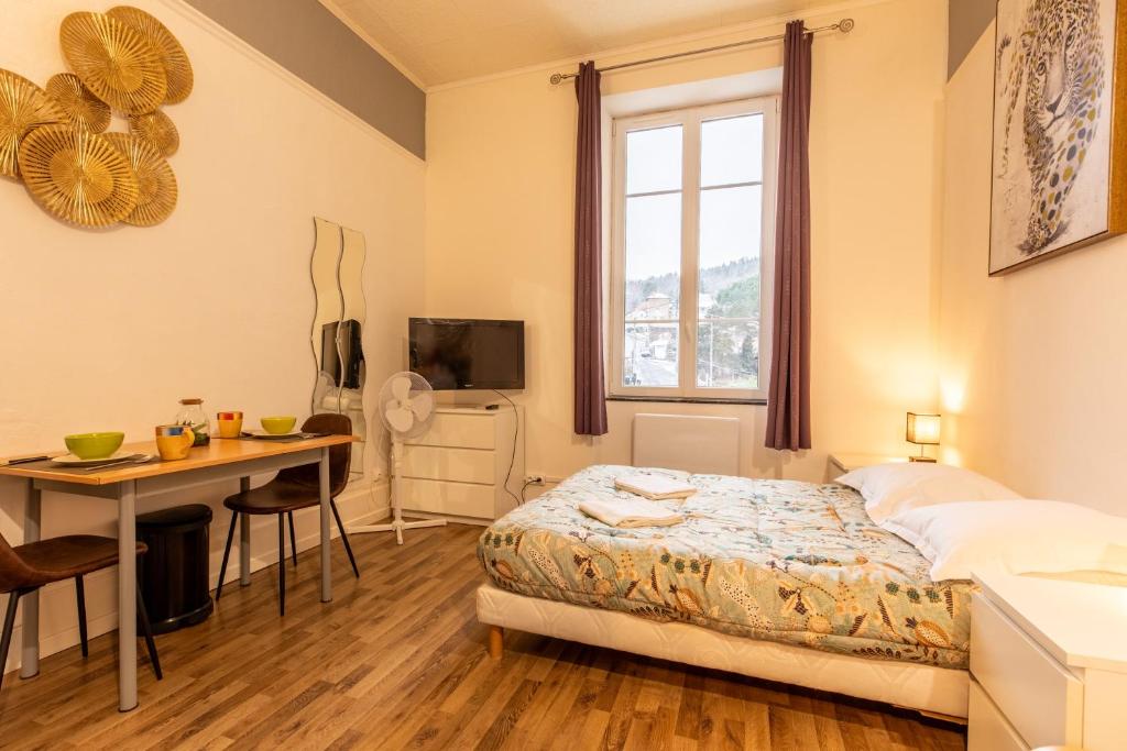 Postel nebo postele na pokoji v ubytování Résidence du Parc appartement calme