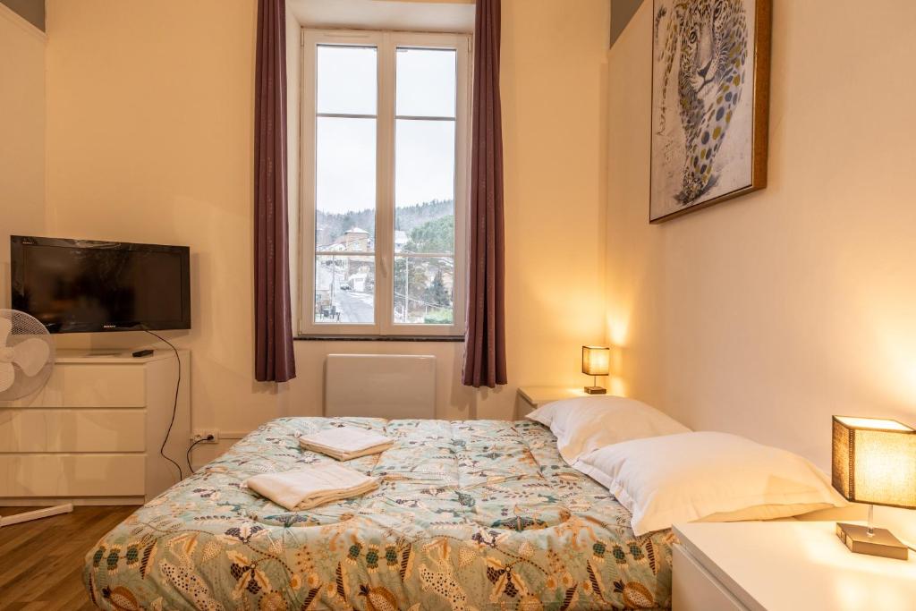 Postel nebo postele na pokoji v ubytování Résidence du Parc appartement calme