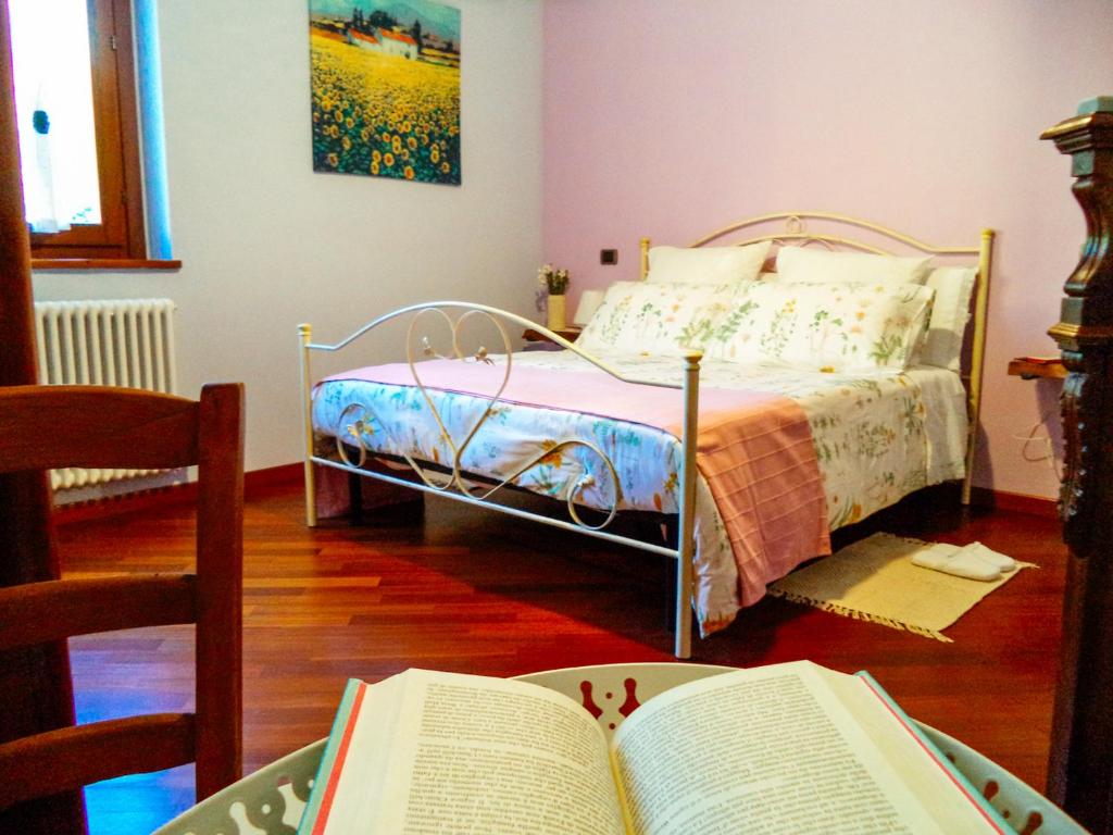 Postel nebo postele na pokoji v ubytování Alba dei Due Soli B&B