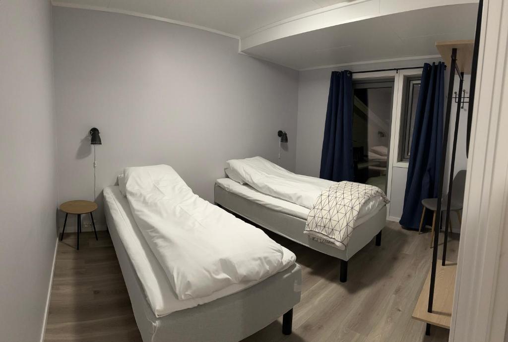 Postel nebo postele na pokoji v ubytování Lofoten Overnatting - Leknes