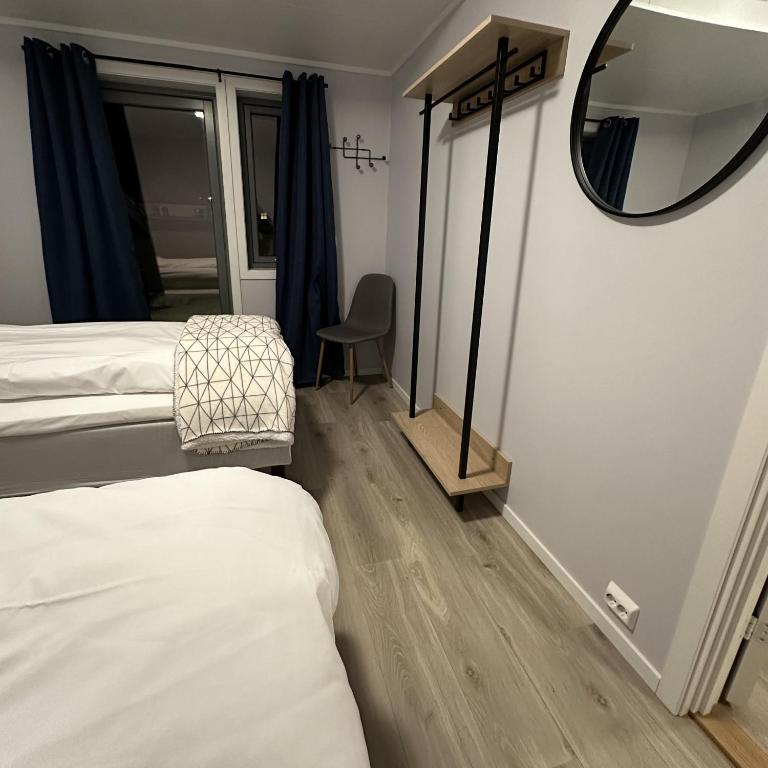 Postel nebo postele na pokoji v ubytování Lofoten Overnatting - Leknes