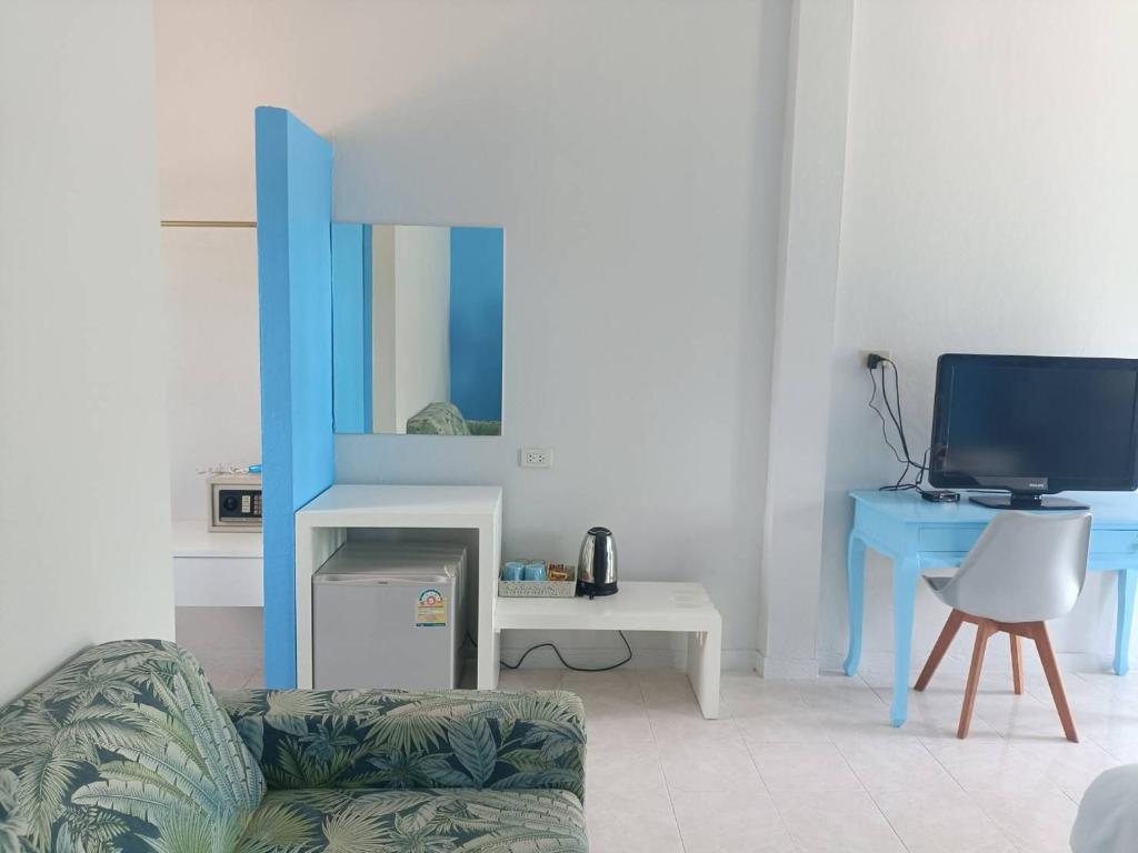 TV a/nebo společenská místnost v ubytování March Samui Resort