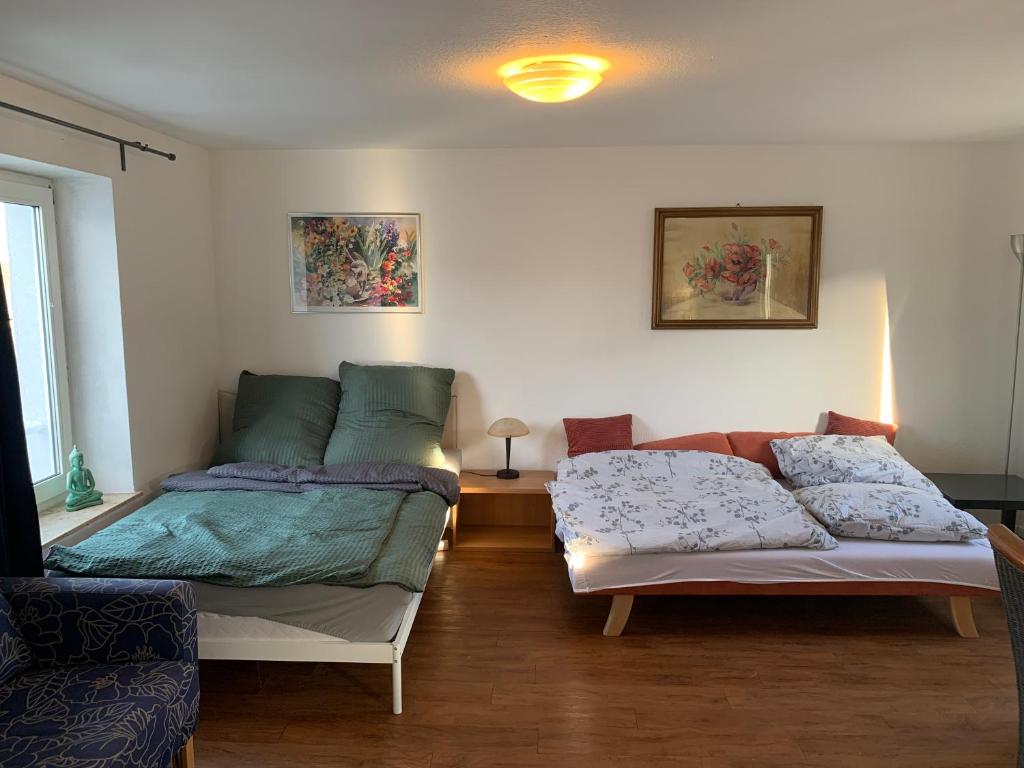 Vuode tai vuoteita majoituspaikassa Easy travel: central apartment in Krefeld