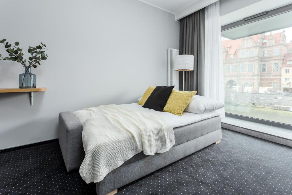 Posteľ alebo postele v izbe v ubytovaní Rent like home - Apartamenty DEO PLAZA