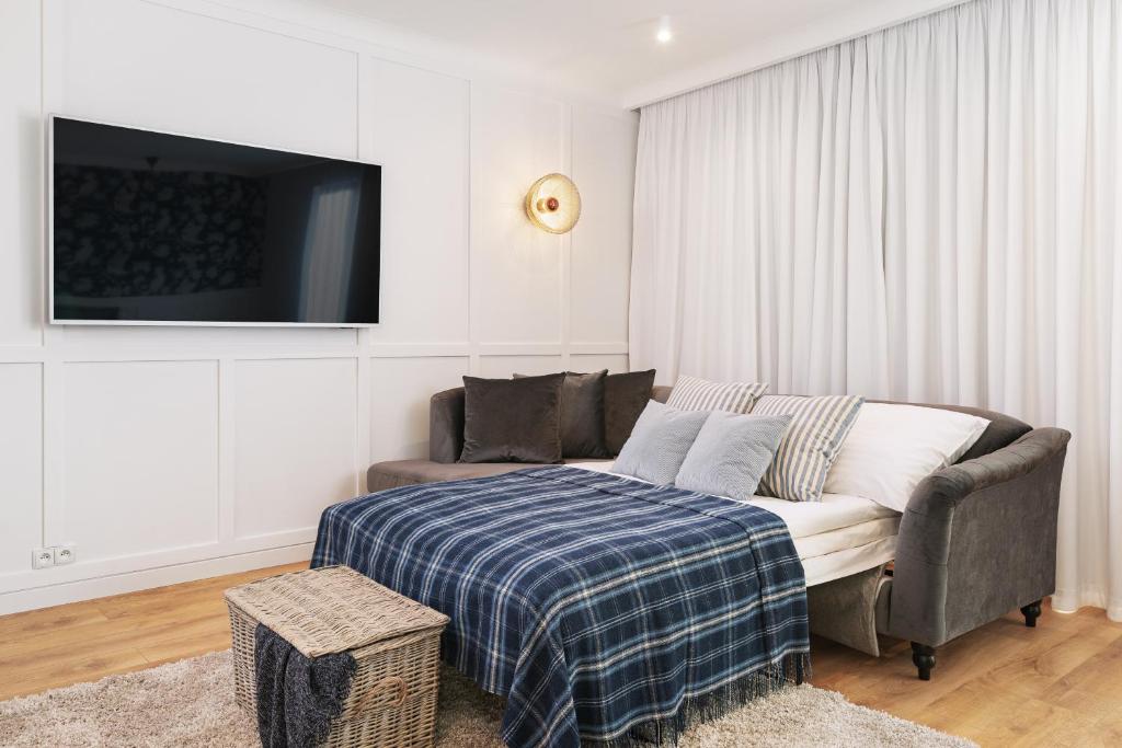 Televízia a/alebo spoločenská miestnosť v ubytovaní Rent like home - Apartamenty DEO PLAZA