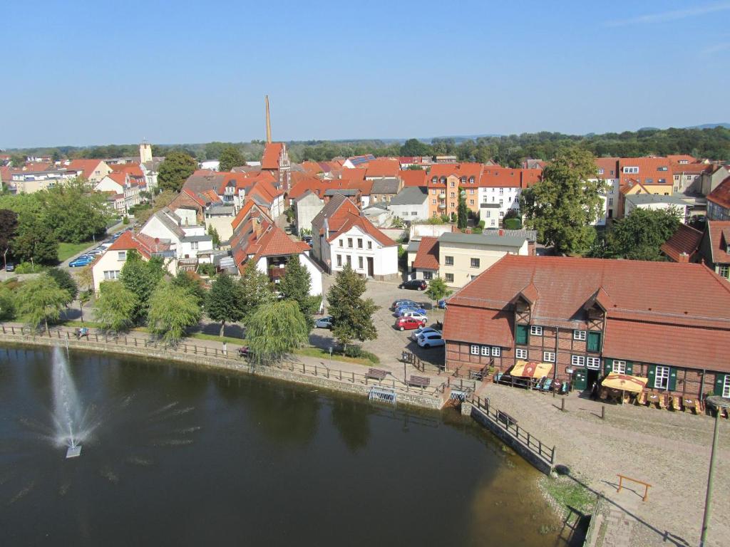 an aerial view of a town next to a river at Ferienhaus am Mühlenteich in Teterow