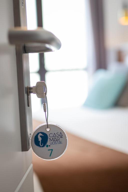 Postel nebo postele na pokoji v ubytování Hostal Boutique Casa del Mar Altea