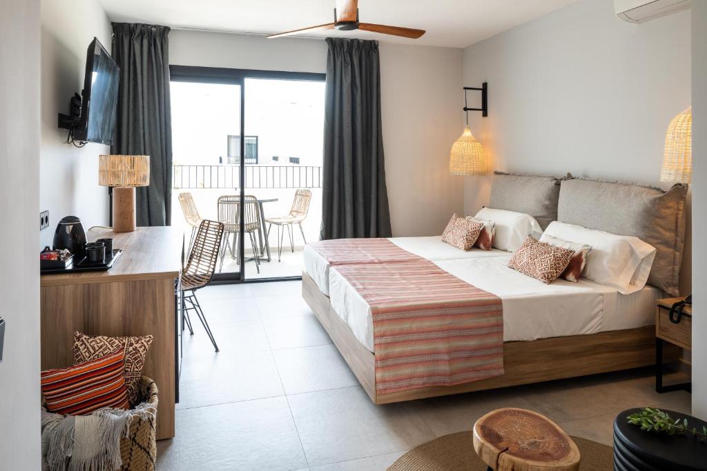 Postel nebo postele na pokoji v ubytování Aparthotel Casita Blanca - Adults Only