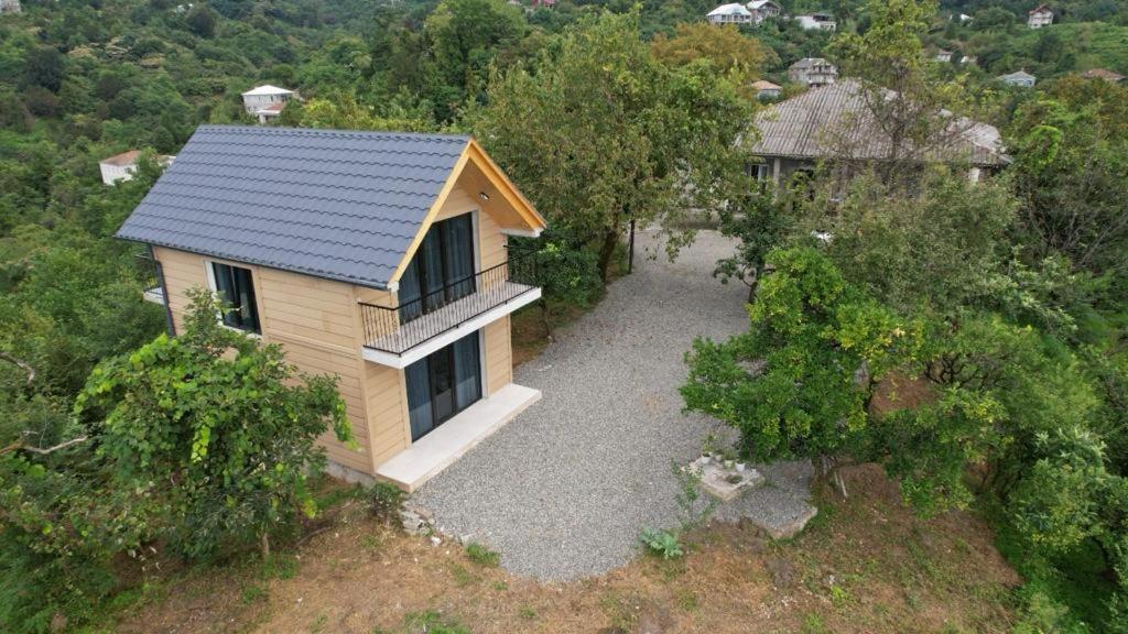 an overhead view of a small house with a driveway at B-XON Makhinjauri in Batumi