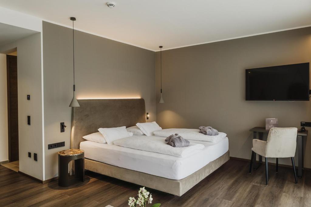 Postel nebo postele na pokoji v ubytování Klein Fein Hotel Anderlahn