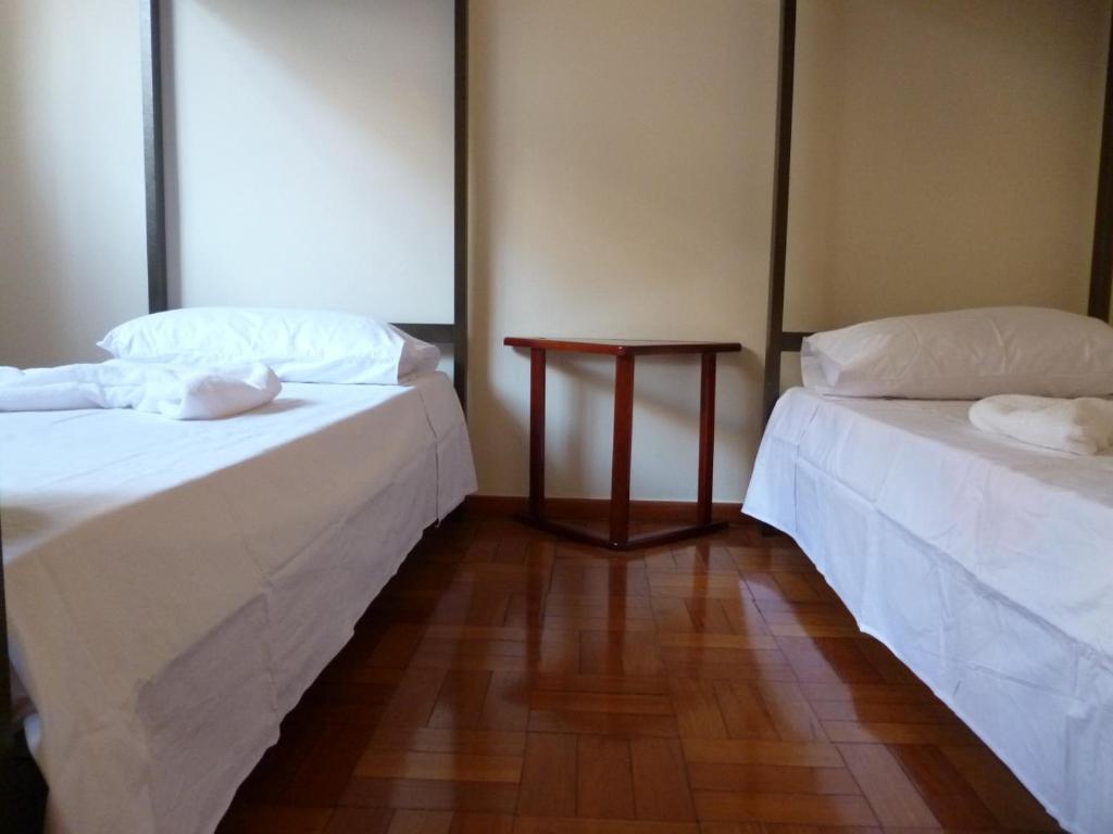 Postel nebo postele na pokoji v ubytování Hostel Casa Mineira