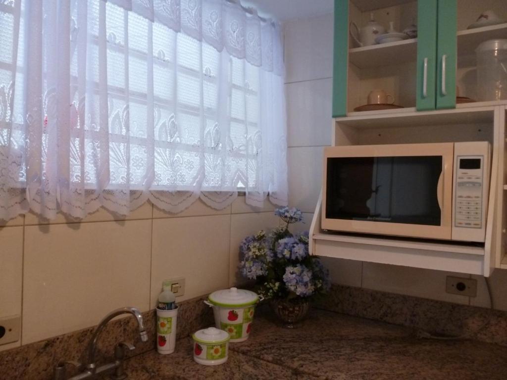 Kuchyň nebo kuchyňský kout v ubytování Hostel Casa Mineira