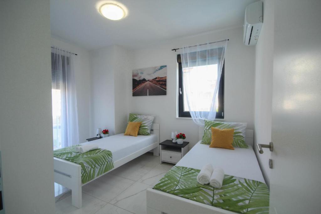 Postel nebo postele na pokoji v ubytování Villa Essenza Mare in Vodice only 650 meters from the beach