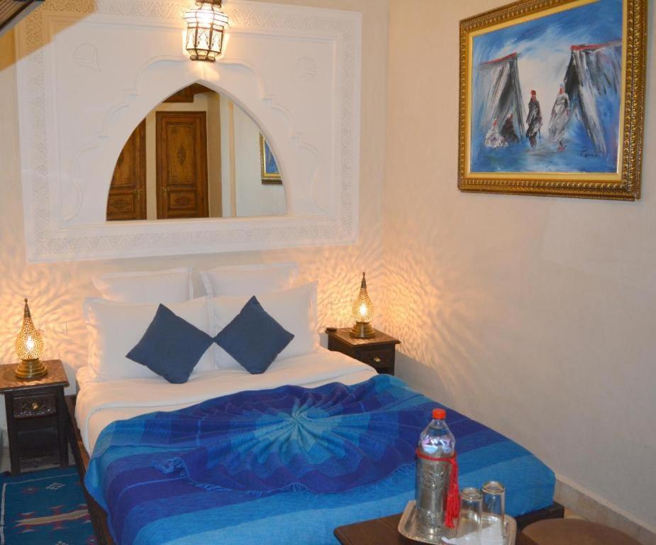 Postel nebo postele na pokoji v ubytování Riad Ghali Hotel & SPA