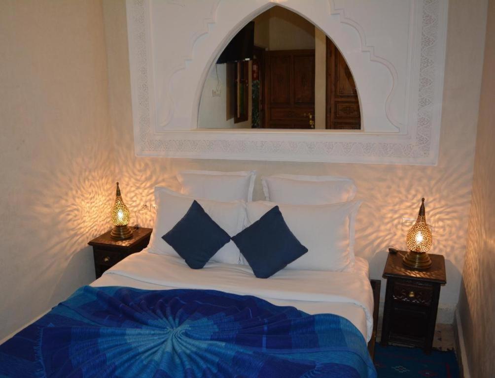 Postel nebo postele na pokoji v ubytování Riad Ghali Hotel & SPA