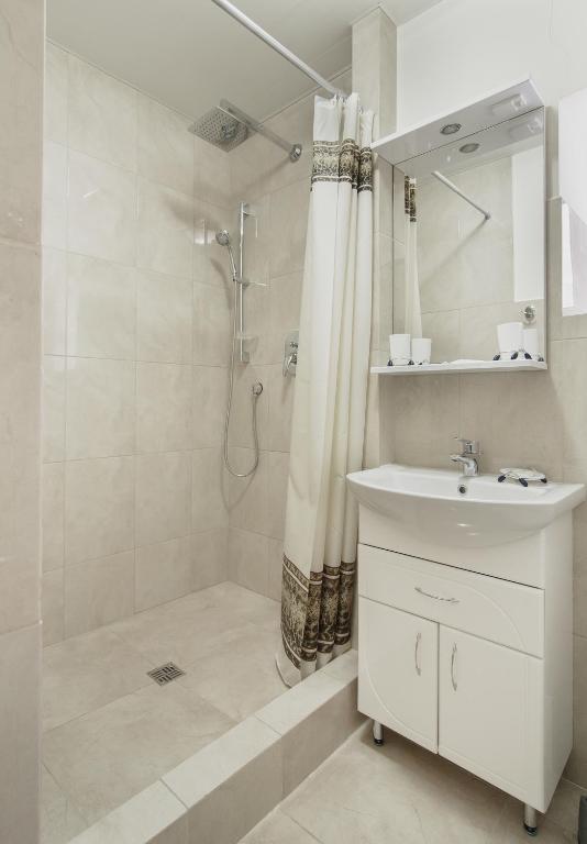 Koupelna v ubytování Consul Hotel Консул