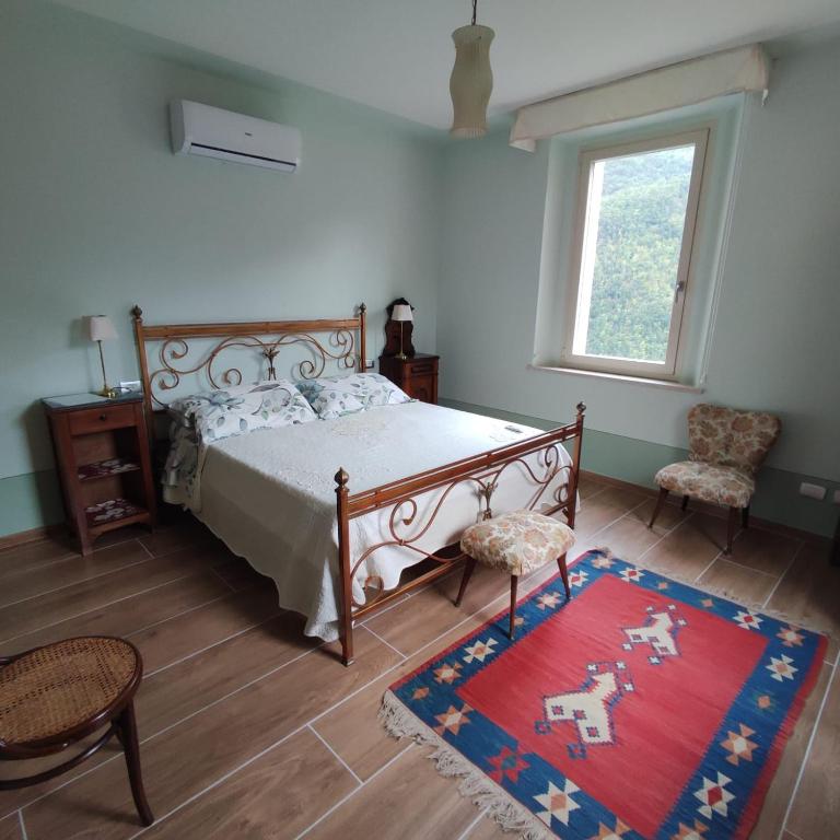 Postel nebo postele na pokoji v ubytování CantoQuinto Bed and Breakfast
