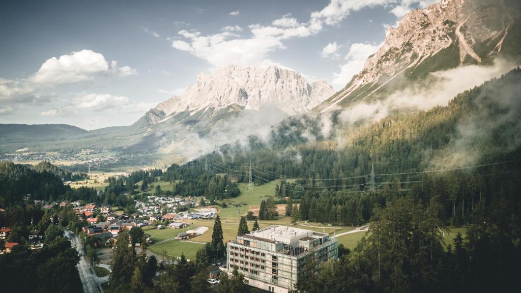 a town in a valley in front of a mountain at MyTirol in Biberwier