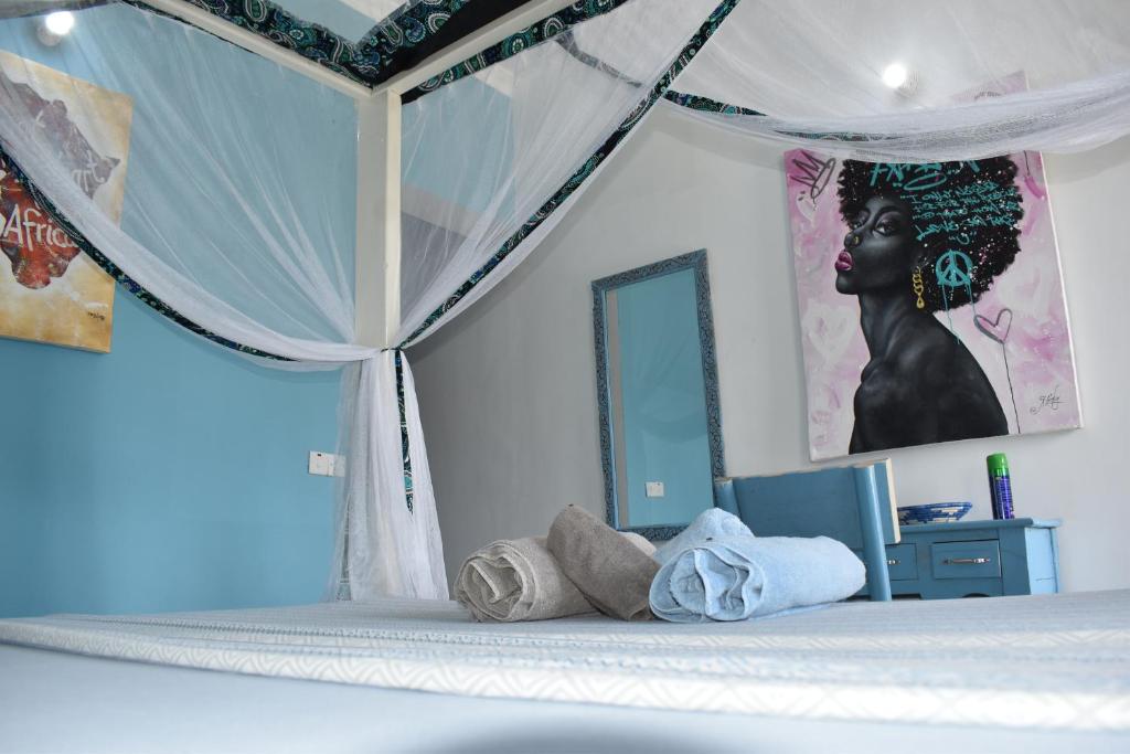 Postel nebo postele na pokoji v ubytování Pineapple House