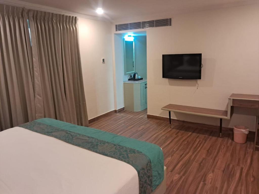 TV a/nebo společenská místnost v ubytování Hotel Grand Residence