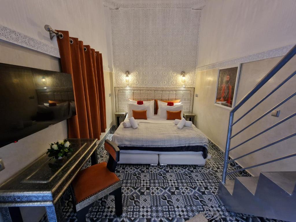Postel nebo postele na pokoji v ubytování Riad Explore
