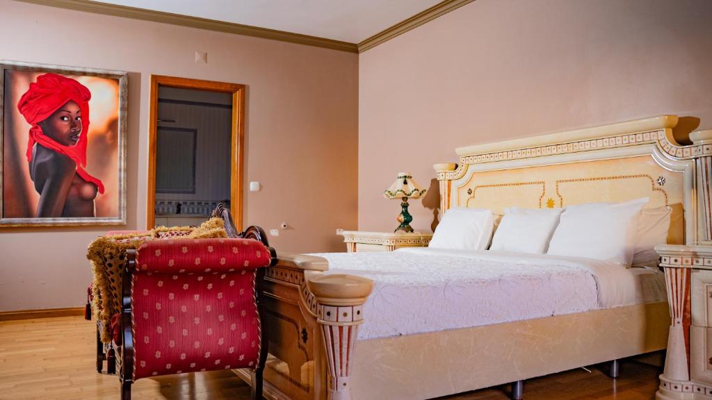 Tempat tidur dalam kamar di Sunset Dourado Villa