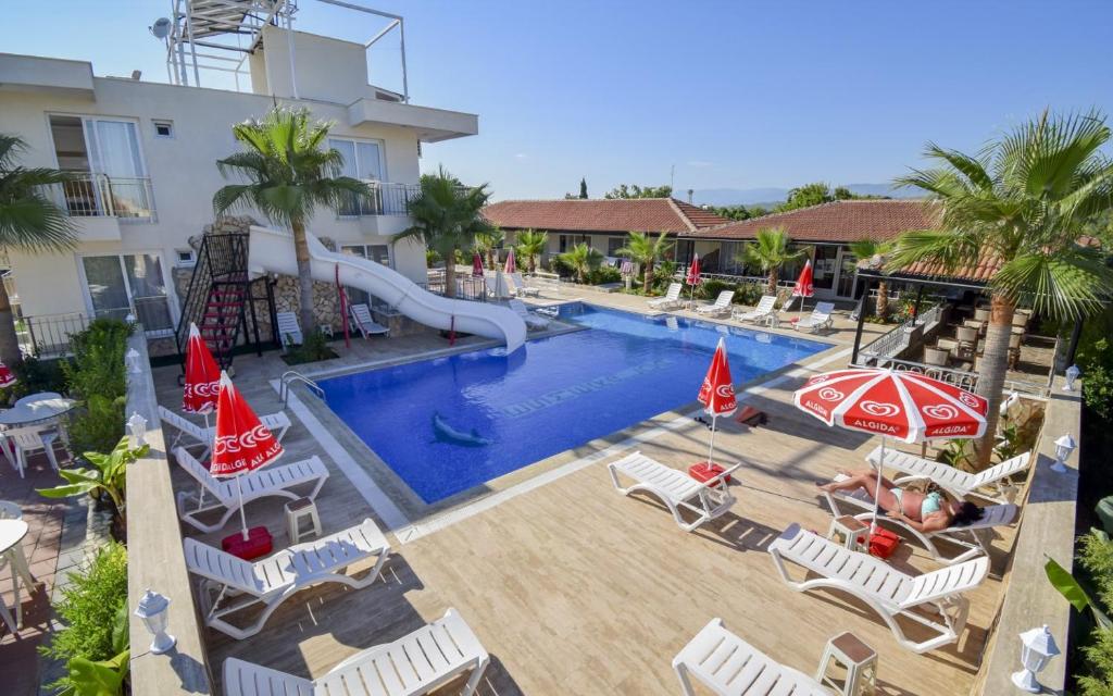 an image of a swimming pool at a resort at Esmeralda Butik Hotel in Kızılot