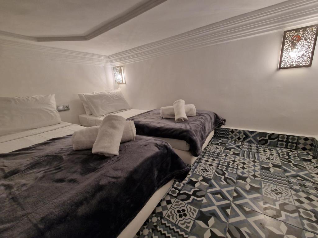 Postel nebo postele na pokoji v ubytování Riad Explore