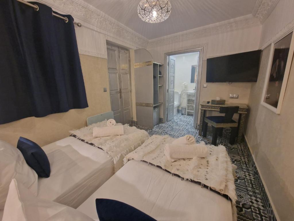 Postel nebo postele na pokoji v ubytování Riad Explore