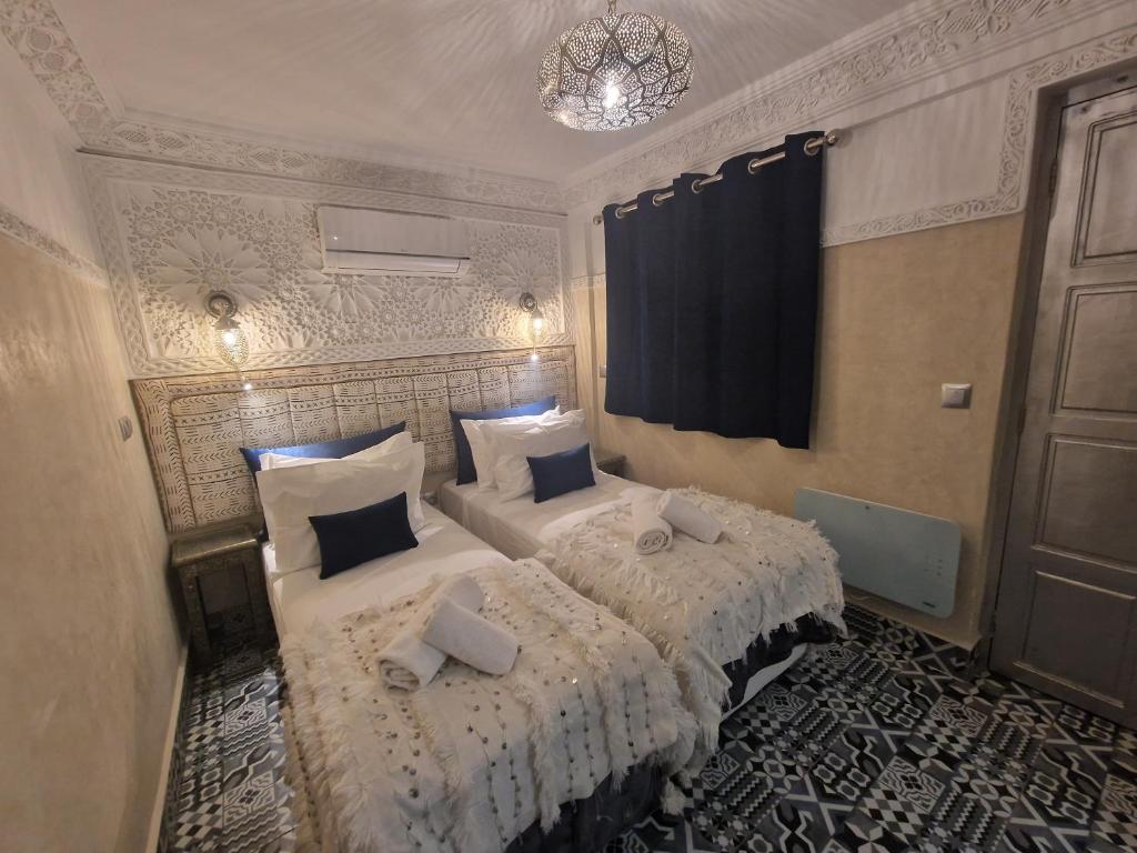 Postel nebo postele na pokoji v ubytování Riad Explore